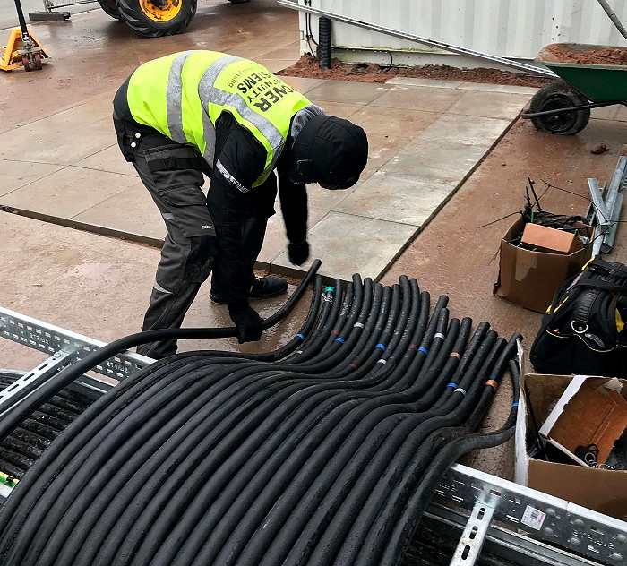 Power continuity engineer pulling cable