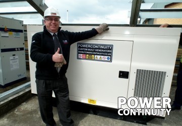 Power continuity engineer servicing diesel generator