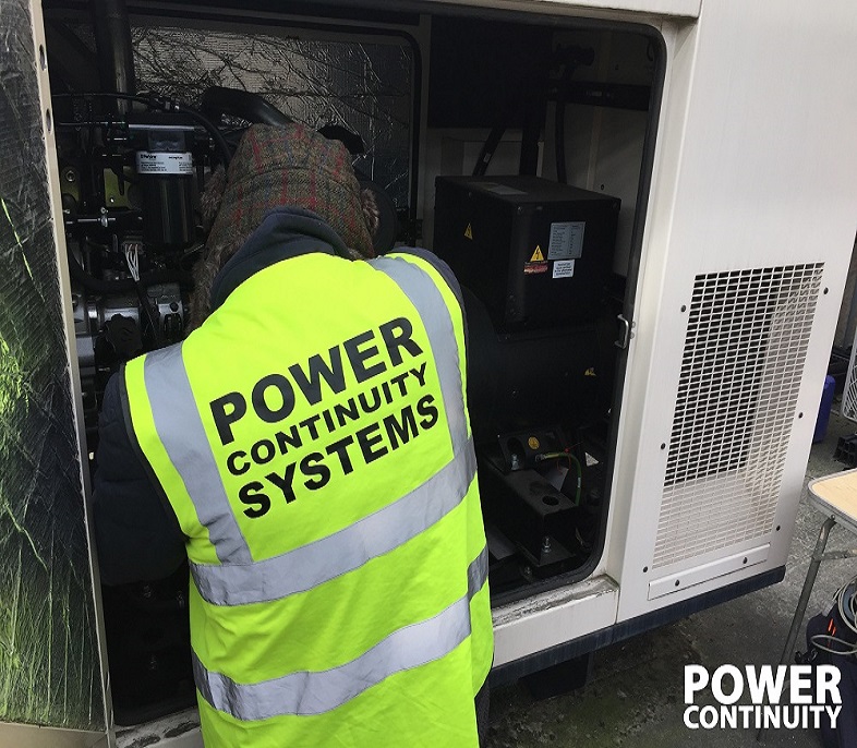 Power continuity engineer servicing generator