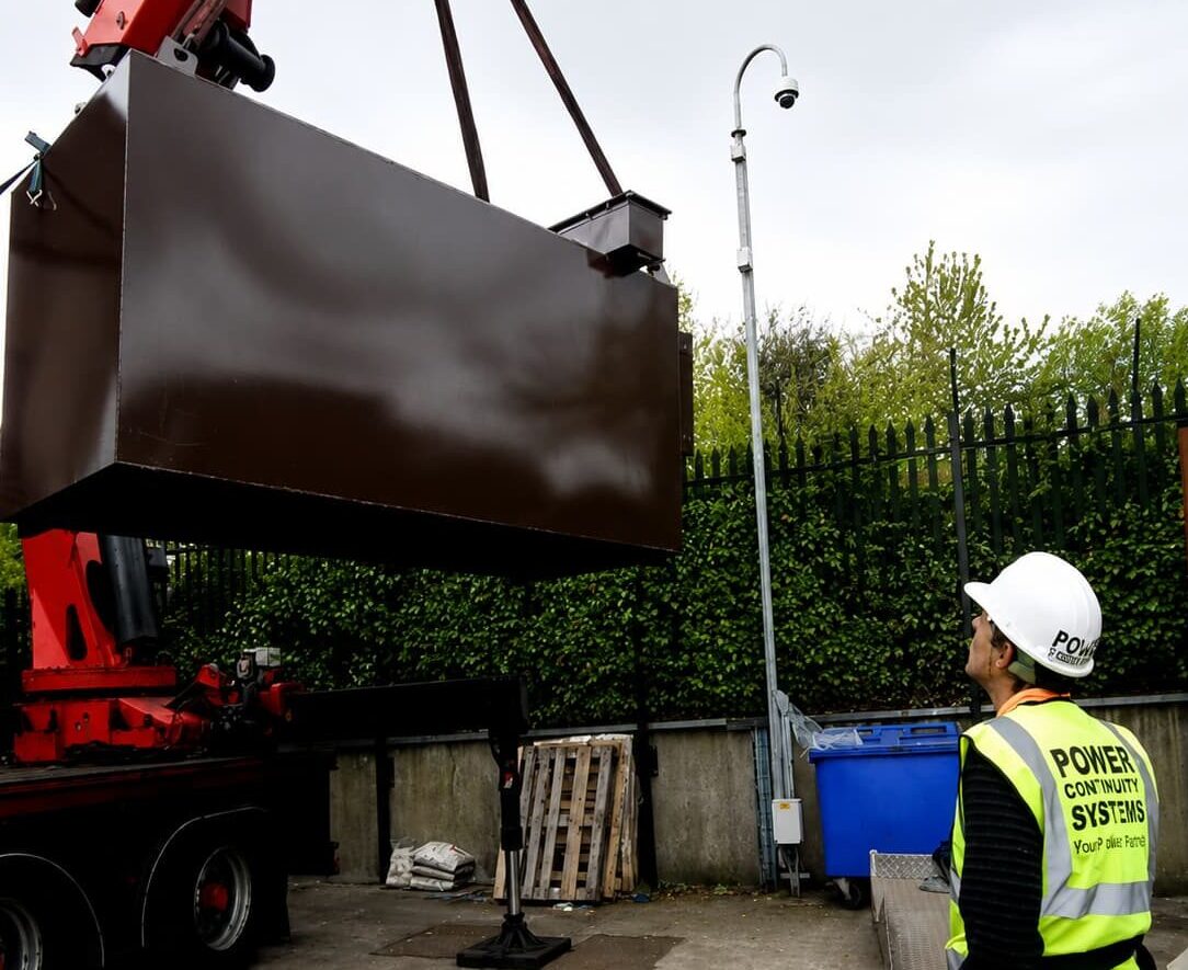 Power continuity engineer supervising fuel tank removal