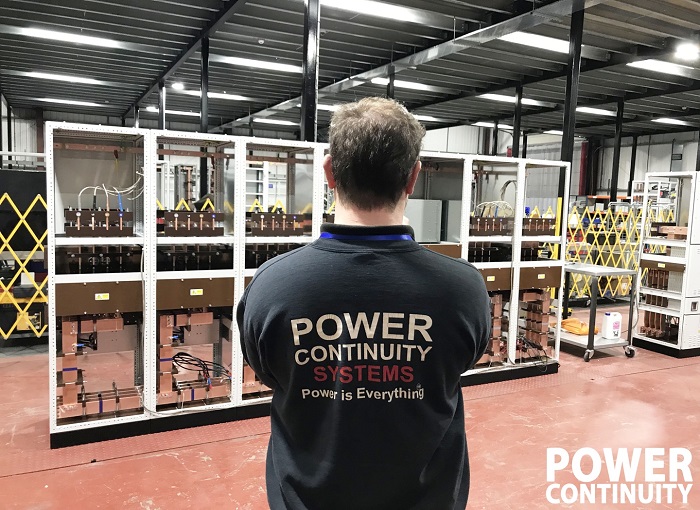 Power continuity engineer with lv mains panel under construction