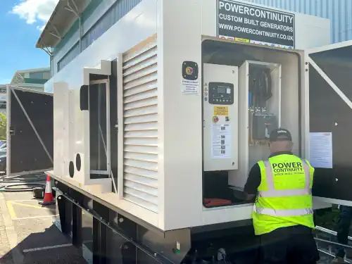 Power continuity engineer working on a 450kva generator