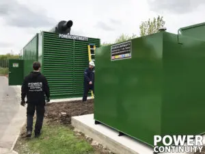 Power continuity engineers and diesel generator in green container