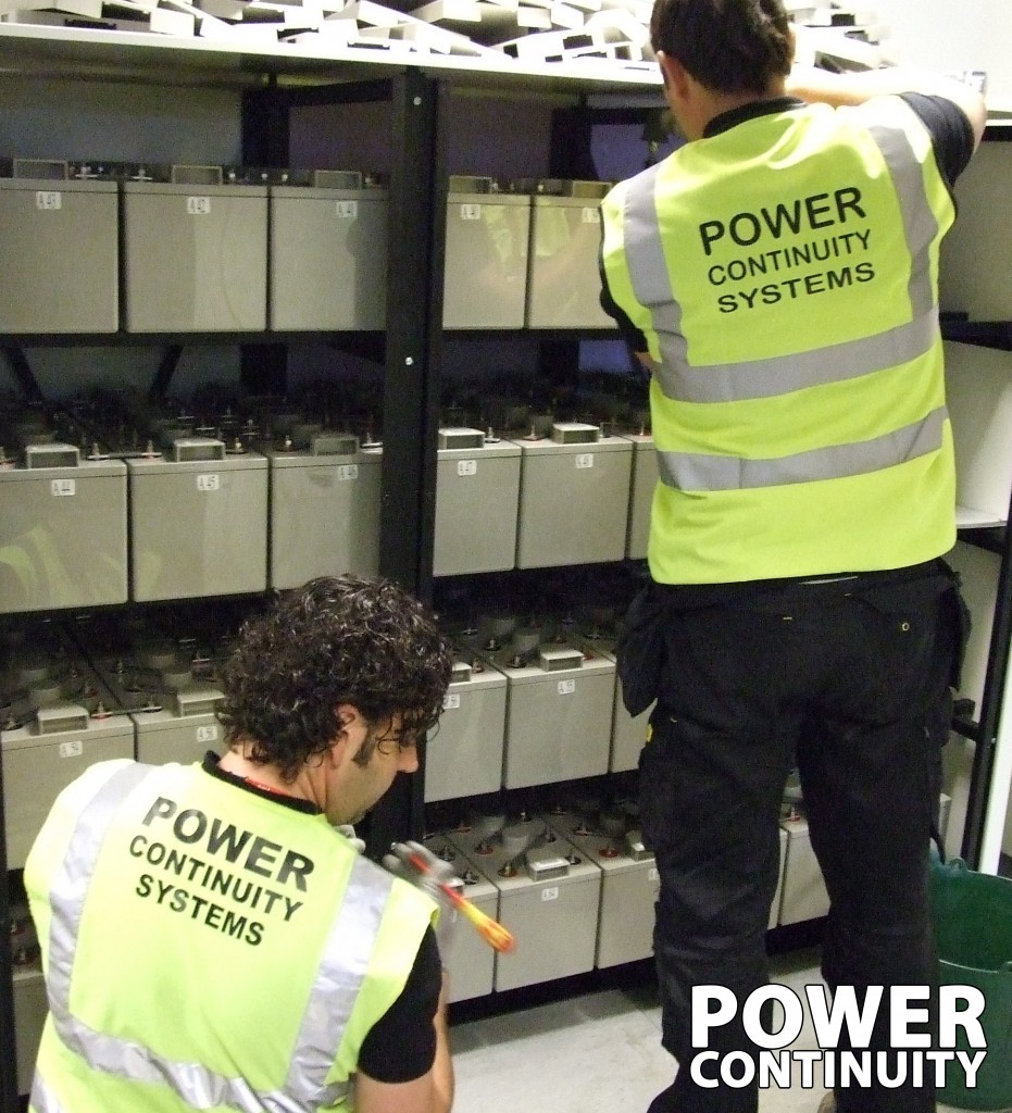 Power continuity engineers changing ups batteries