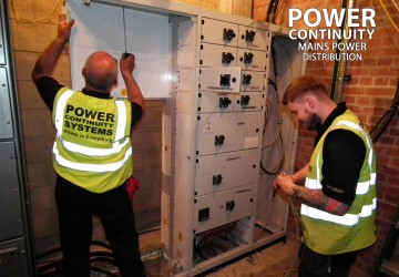 Power continuity engineers installing lv mains distribution switchgear panel