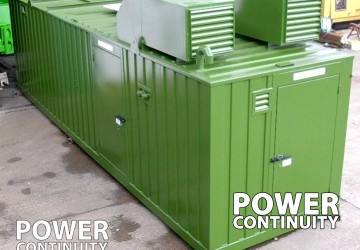 Power continuity large generator in green container birds eye view