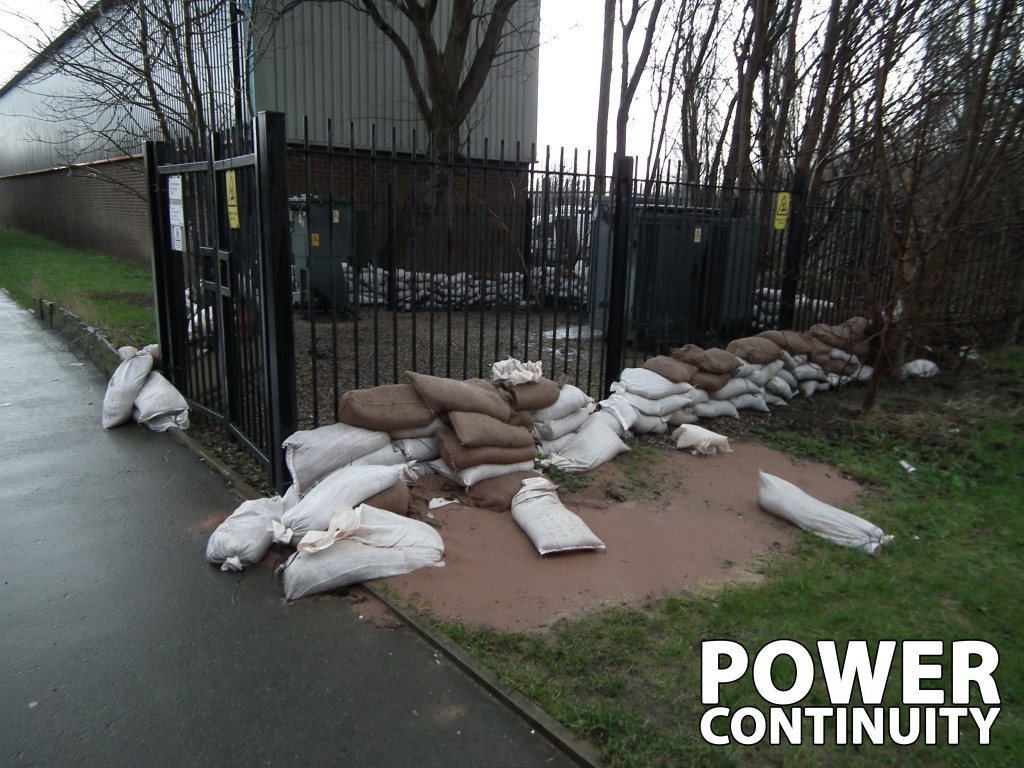 Power continuity sandbags in front of the substation