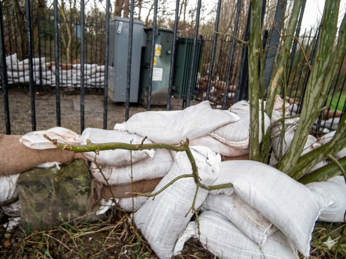 Power continuity sandbags in front of the transformer